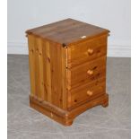 A pine bedside chest fitted three drawers, 47cm wide x 44cm deep x 64cm high and a 1940's mahogany