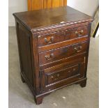 An antique oak three drawer chest, with panelled sides and base drawer 94cm x 73cm x 53cm marks,