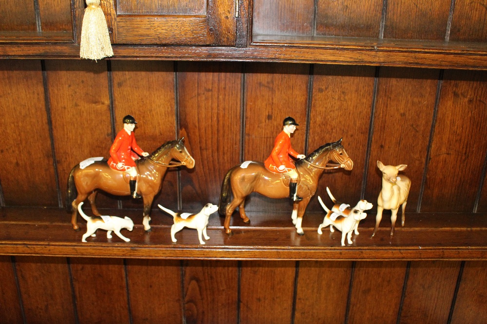 Two Beswick pottery huntsmen (one modern), four Beswick hounds, and a Beswick deer, all in good - Image 4 of 4