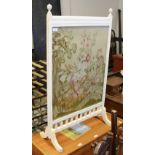 Ex Corby Castle, A late Victorian firescreen, with tapestry panel and reeded white painted frame,