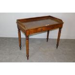 A Victorian mahogany washstand, with shallow three-quarter gallery and rectangular top above a