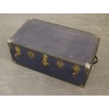 A large blue canvas travel trunk, with blue checked material lining 37cm x 92cm x 51cm used but