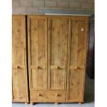 A modern Alstons rustic pine effect triple wardrobe 184cm x 116cm x 52cm some minor scratches.