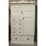 A Victorian painted-walnut wardrobe, having a shaped cornice with central sunburst motif over a