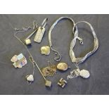 A small selection of silver and white metal jewellery, including gold front & back locket, chains,