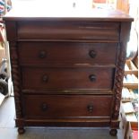 A Victorian mahogany chest of drawers, with blind frieze drawer over four long drawers and barley