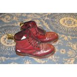 A pair of Dr Martens cherry red boots, UK size 11, used condition but generally good.