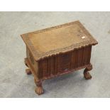A Kashmiri carved walnut box, the hinged rectangular top with foliate carved border over the moulded