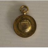 A 9ct gold Isle of Man Football Association 2nd league winners medal, Onchan named for L. Johnson