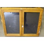 A glazed oak display case 77cm x 90cm some paint residue.