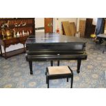 A Steinway & Sons Model 'A’ ebonised grand piano, serial number A 283164, also marked A4 23 8 1392