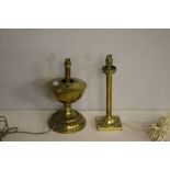 A converted brass oil lamp 33cm and a brass table lamp with moulded stylised petal collar 35cm