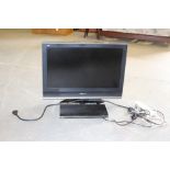 A Panasonic 32" flatscreen television, a Toshiba DVD plater two remote controls, scart cable etc.
