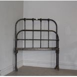 A Victorian iron-framed single bed 105cm x 87cm barn stored condition, lacking irons.