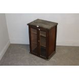 An Edwardian glazed and stained pine cupboard, 73cm x 52cm x 37.5cm re-glazed, marks and scratches.