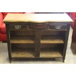 A late Victorian mahogany sideboard base, with lobed central section, converted as a bookcase/