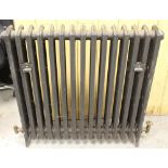 A large cast-iron radiator, 96cm x 94cm in good condition.