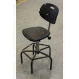 A Dauphin industrial/machinists swivel chair with moulded plastic seat and back rest, used