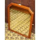 A Victorian mahogany mirror with canted upper corners, formally a dressing table mirror 61cm x