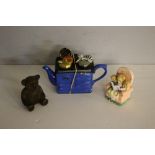 A Swineside Ceramics novelty teapot (chip to inner rim) and two bear ornaments