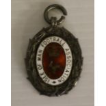 An enamelled silver Isle of Man Football Association medal/medallion 2.3cm x 2.7cm 10grams,