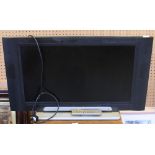 A Hitachi 32" flatscreen LCD television, with remote control, used condition.