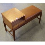 A 1970's/80's teak telephone table, with single drawer 62cm x 100cm x 41cm Generally good