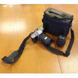 A Pentax MZ-50 digital SLR camera, Tamron 80-210 lens, Tamron 28-80 lens, and camera bag. used