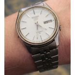 A steel Seiko 5 automatic wrist watch with day/date aperture, steel bracelet 36mm, used condition,