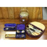 A vintage oak and silver plate biscuit barrel and a small selection of flatware/cutlery, used