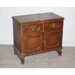 An early 20th century oak cupboard in the Charles II style, by Simpson's - Blackburn & Halifax, with