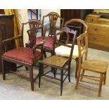 A group of five miscellaneous chairs.