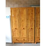 A modern Alstons rustic pine effect triple wardrobe 184cm x 116cm x 52cm some minor scratches.