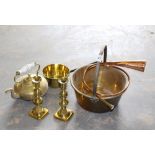 A brass jam pan, brass toffee pan, brass candlesticks, brass kettle, and copper horn.