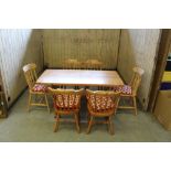 A modern pine refectory table, with shaped supports linked by stretchers 73cm x 147cm x 74cm sold