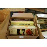 A box of cookery, baking related books.