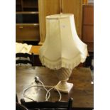 A marble effect pottery urn shaped electric table lamp with silk shade, 75cm high including shade,