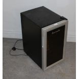 A Baumatic bottle fridge, with smoked glass door 64cm x 50cm x 36cm in good used condition.
