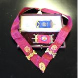 A small group of 'the Order of Buffaloes' regalia, with leather covered case, some tarnishing and