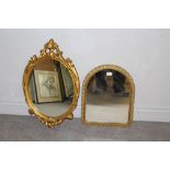 A vintage arched gilt framed mirror and a modern reproduction gilt framed mirror of 19th century