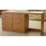 A modern laminate dressing table 71cm x 100cm x 46cm and a matching three drawer bedside chest