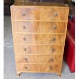 A 1940's figures mahogany six drawer chest, 135cm x 84cm x 46cm marks and scratches, one back leg