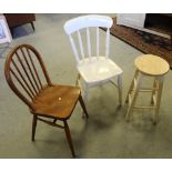 An Ercol style elm seated stick-back chair 86cm together with a white painted chair and stool.