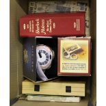 A box of miscellaneous items, Star Wars plush toy, Sherlock Holmes book, 50's newspaper gift pack,