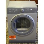 A Hotpoint Aquarius 7kg B class tumble dryer in grey, 85cm x 60cm x 49cm, used condition, appears