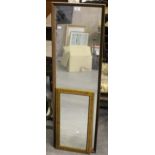 A 1970's teak framed oblong mirror (from a dressing table) 117cm and a small pine framed mirror 56cm