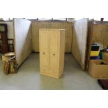 A modern Alstons bleached pine effect double door wardrobe with base drawer 167cm x 77cm x 51cm