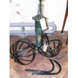 HP 75 cast iron water pump and a pair of iron hanging baskets. We are unable to do condition reports