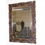 Early 20th century oak jacobean style wall mirror. We are unable to do condition reports on our