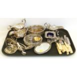 Three various plated sauce boats, wine coaster, salt cellars, silver embossed mirror, silver caddy